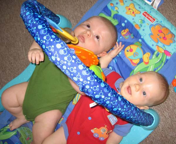 Ian and Leilani playing in Ian's gym