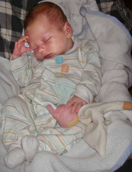 Leilani sleeping with her doll