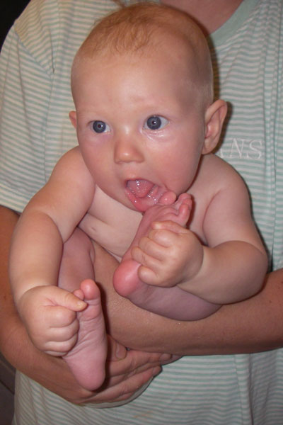  playing with toes naked