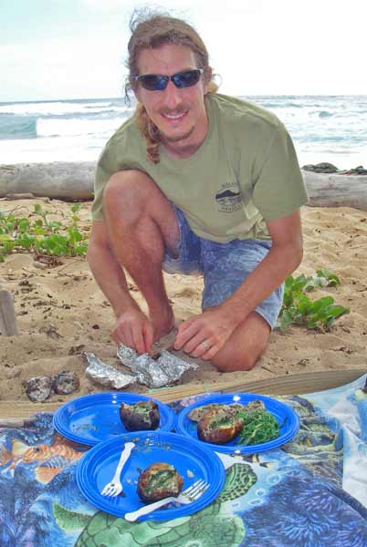 Andy preparing food at the picnic at the Wailua Beach