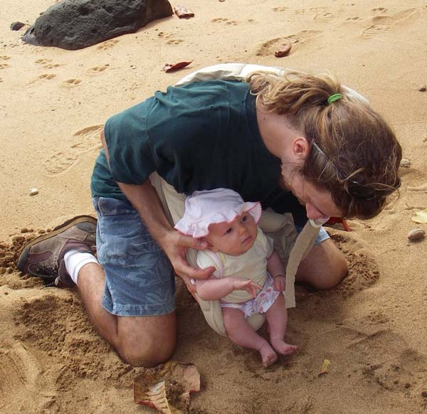 Andy and Leilani playing in the sand